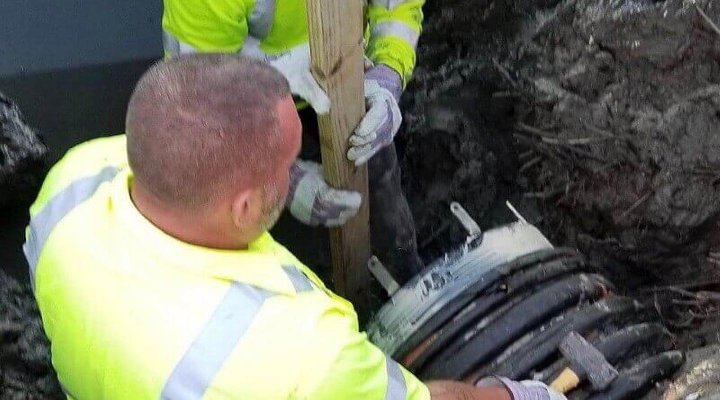 wapro-worker-installs-a-check-valve-to-prevent-water-go-back