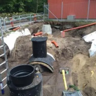 Construction site with pipes and materials for WaReg installation at Backaryd Waterworks handling 16 liters per second backwash